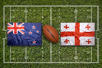 Image showing New Zealand vs. Georgia flags on rugby field