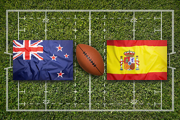 Image showing New Zealand vs. Spain flags on rugby field