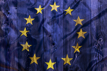 Image showing National flag of European Union, wooden background