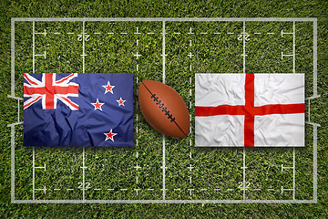 Image showing New Zealand vs. England flags on rugby field