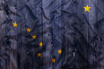 Image showing National flag of Alaska, wooden background