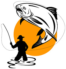 Image showing Fly Fisherman catching a leaping trout