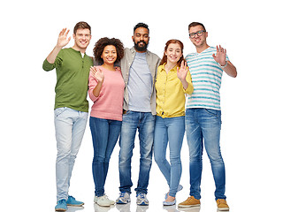 Image showing international group of happy people waving hands