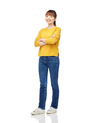 Image showing happy asian young woman over white