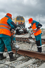 Image showing Railway workers repairing rail in Tobolsk. Russia