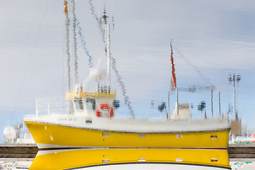 Image showing Reflection of a small fishing vessel