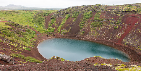 Image showing Kerid is a crater lake of a turquoise color - Iceland