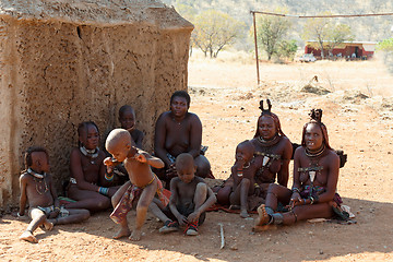 Image showing Himba woman with child in the village