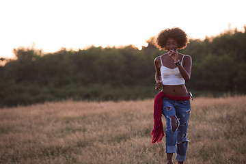 Image showing young black woman in nature