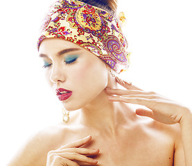 Image showing young pretty modern girl with bright shawl on head emotional posing isolated on white background, asian people ethnicity