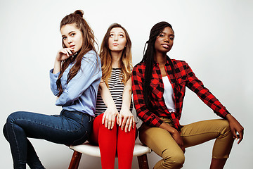 Image showing diverse multi nation girls group, teenage friends company cheerful having fun, happy smiling, cute posing isolated on white background, lifestyle people concept, african-american and caucasian