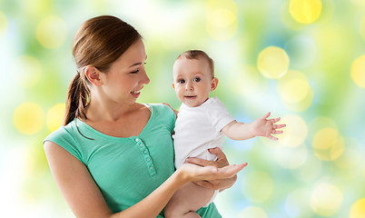 Image showing happy young mother with little baby