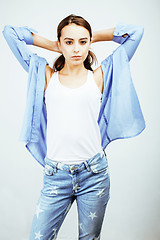 Image showing young pretty stylish hipster girl posing emotional isolated on white background happy smiling cool smile, lifestyle people concept