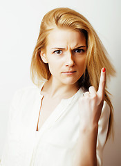 Image showing young blond woman on white backgroung gesture thumbs up, isolate
