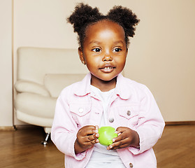 Image showing little cute african american girl playing with animal toys at ho