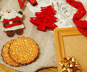 Image showing lot of stuff for handmade gifts, scissors, ribbon, paper with countryside pattern, ready for holiday concept, nobody home 