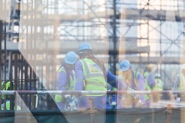 Image showing Team of construction worker on construction site.