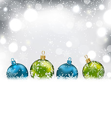 Image showing Winter Background with Colorful Glass Balls and Snowflakes