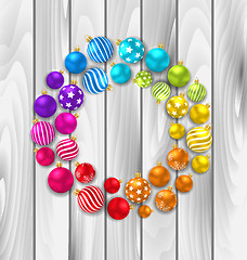 Image showing Set Colorful Christmas Glass Balls on Wooden Background