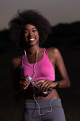 Image showing african american woman jogging in nature