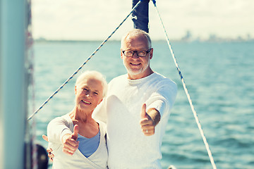 Image showing senior couple sailing on sea boat or yacht