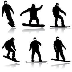 Image showing Set black silhouettes snowboarders on white background.