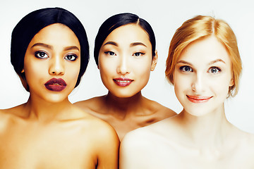 Image showing three different nation woman: asian, african-american, caucasian together isolated on white background happy smiling, diverse type on skin, lifestyle people concept