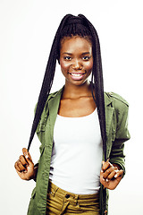 Image showing young pretty african-american girl posing cheerful emotional on white background isolated, lifestyle people concept