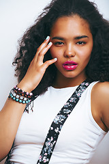 Image showing young pretty african-american teenage woman posing in fashion clothers emotional, lifestyle people concept
