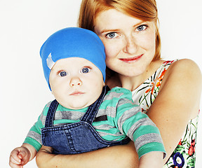 Image showing young beauty mother with cute baby, red head happy modern family