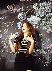 Image showing back to school after summer vacations, cute teen real girl in classroom, lifestyle people concept