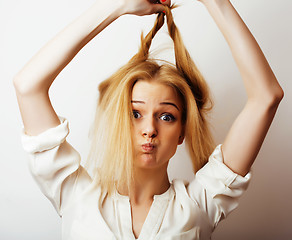 Image showing young blond woman on white backgroung gesture thumbs up, isolate