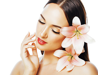 Image showing young attractive lady close up with hands on face isolated flowe