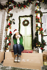 Image showing pretty happy smiling young teenage hipster girl infront of decor