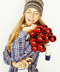 Image showing young pretty blond teenage girl in winter hat and scarf on white