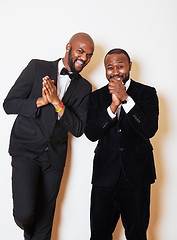 Image showing two afro-american businessmen in black suits emotional posing, g