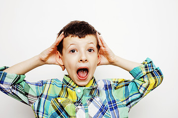 Image showing young pretty little boy kid wondering, posing emotional face isolated on white background, gesture happy smiling close up, lifestyle people concept