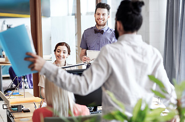 Image showing happy creative team in office