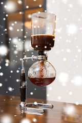 Image showing close up of siphon vacuum coffee maker at shop