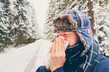 Image showing Ill man in winter nature