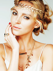 Image showing young blond woman dressed like ancient greek godess, gold jewelr