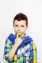 Image showing young pretty little boy kid wondering, posing emotional face isolated on white background, gesture happy smiling close up, lifestyle people concept