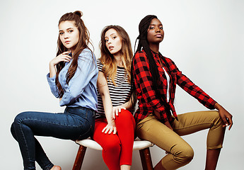 Image showing diverse multi nation girls group, teenage friends company cheerful having fun, happy smiling, cute posing isolated on white background, lifestyle people concept, african-american and caucasian