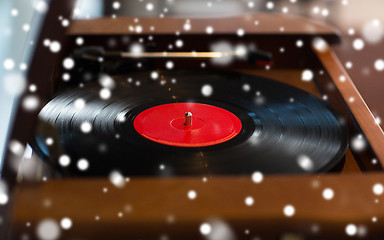 Image showing close up of vintage record player with vinyl disc