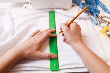 Image showing Girl makes pattern top view