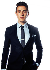 Image showing young pretty business man standing on white background, modern hairstyle, posing emotional, lifestyle people concept