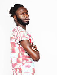 Image showing young handsome african american boy smiling emotional isolated on white background, in motion gesturing smiling, lifestyle people concept