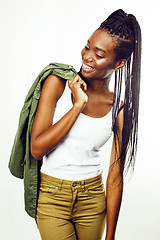 Image showing young pretty african-american girl posing cheerful emotional on white background isolated, lifestyle people concept