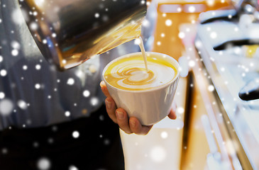 Image showing close up of woman making coffee at shop or cafe