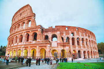 Image showing The Colosseum with people at night